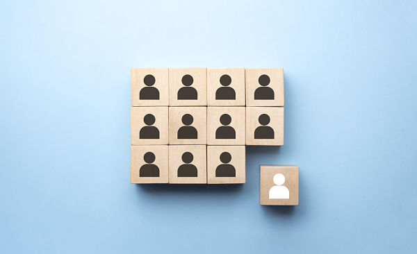 Human resource management and recruitment business concept, Copy space. Hand putting wood cube block on top pyramid, and leadership of manager concept.